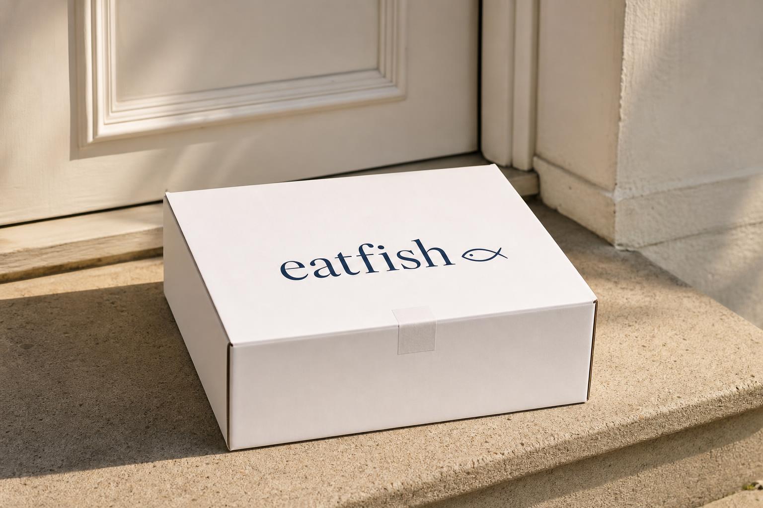 Eatfish branded kraft delivery box on a sunlit doorstep